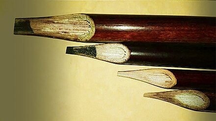 The inkstained cut tips of reed pens