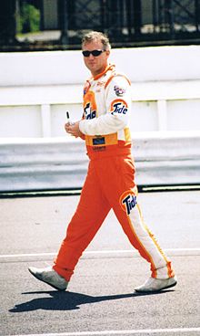 Ricky Rudd walks down pit road, before qualifying at Pocono Raceway 1998 Ricky Rudd Pocono June 98.jpeg