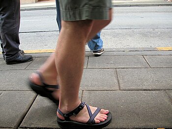 An example of walking in sandals.