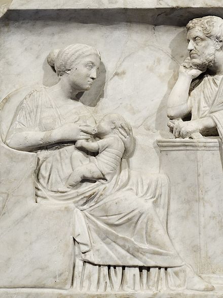 Relief from a child's sarcophagus depicting a nursing mother with the father looking on (c. 150 AD)