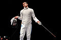 * Nomination Foil fencer Andrea Baldini discussing with the referee. --Jastrow 13:58, 12 March 2013 (UTC) * Promotion Good quality with a nice composition. Pymouss 16:06, 12 March 2013 (UTC)