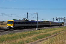 Two sets operating under Connex Melbourne, travelling between Craigieburn and Roxburgh Park in January 2009 (710M-2505T-709M-M-T-M) SiemensCraigieburnRoxburghPark.JPG
