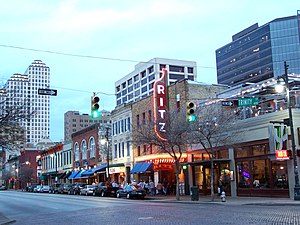 Local businesses and recreational venues like 6th Street often are next door to office buildings. Sixth Street Austin.jpg