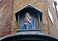 Statuette in Wilfred Street, Westminster.