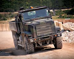 An Oshkosh 4x4 MTVR fitted with TerraMax autonomous technology; this vehicle had previously participated in 2007 DARPA Grand Challenge