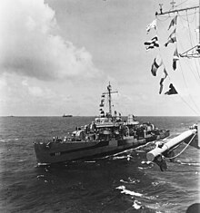 USS Paul Hamilton (DD-590) comes alongside USS Makin Island (CVE-93) on 11 March 1945 (NH 42812).jpg