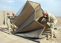 United States Navy Seabees assembling HESCO MIL units.