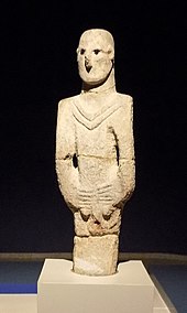 The Urfa Man, from Upper Mesopotamia circa 9000 BC, the "oldest naturalistic life-sized sculpture of a human". Sanliurfa Museum. Urfa man.jpg