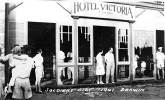 Inspecting the damage following the soldiers riot of September 1941. Vic Hotel 1941.jpg