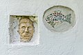 * Nomination Sculpture of a male head and a mosaic of a fish on «Federaun Saddle» in Oberfederaun, Villach, Carinthia, Austria --Johann Jaritz 01:59, 17 May 2017 (UTC) * Promotion Good quality. --Uoaei1 03:55, 17 May 2017 (UTC)