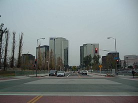 The three tallest skyscrapers of Warner Center, with lower mid-rises around them. Taken from the corner of Owensmouth and Erwin in December 2004. Warner Center Skyscrapers.jpg