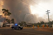 "The Green Wattle Creek bushfire moves towards the Southern Highlands township of Yanderra in Southern Australia as police evacuate residents from Yanderra Road" Yanderra Bushfire.jpg