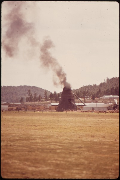 File:"TEEPEE" BURNER INCINERATES WOODCHIPS AND SAWDUST FROM LUMBER MILL - NARA - 544954.tif