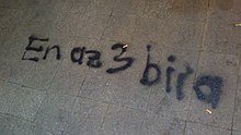 Graffiti seen during the 2013 protests in Turkey, showing the words "At least 3 beers" (Turkish: En az 3 bira
), a reference to the new alcohol restrictions and Erdogan's recommendation for families to have at least three children. Istiklal31may2.jpg