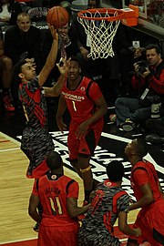 20130403 MCDAAG Nigel Williams-Goss at the rim.JPG