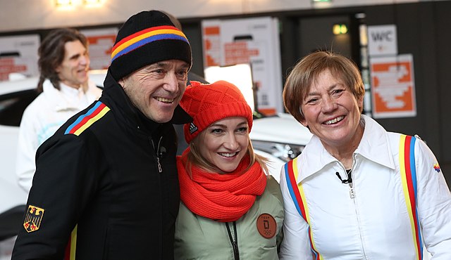 Mittermaier (r.) and her husband with figure skater Aljona Savchenko in 2018