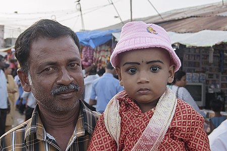 An Indian man and child in Velankanni, Tamil Nadu, India