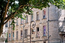 Paintings on the facades of buildings in the town centre Avignon facades.jpg