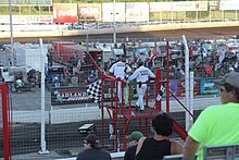 The flagstand, lower grandstands, and infield Badlands Motor Speedway flagstand lowergrandstands infield.jpg