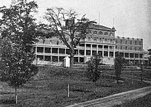 The Brant Hotel in 1902. Located on the shore of Lake Ontario in Burlington, the hotel was erected on the former homestead of Joseph Brant, and was the largest resort in Canada. The hotel was expropriated and used as a military hospital in 1917, demolished and rebuilt in the 1930s, and then demolished in 1964. Brant Hotel - Burlington, Ontario (1902).jpg