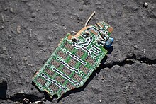 A fragment of a discarded circuit board from a television remote Brokencircuitboard2011.jpg