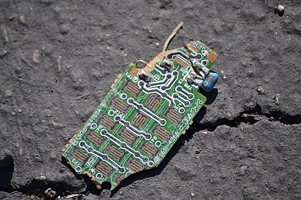 A fragment of a discarded circuit board.