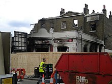 The former Bruce Grove Post Office was destroyed during the 2011 Tottenham riots Bruce Grove Post Office, High Road N17 - geograph.org.uk - 2560665.jpg