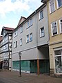 Wohn- und Geschäftshaus + Hinterhaus