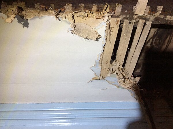 Clay plaster base coat on split oak lath held in place with straw and manure, covered with a lime plaster top coat, Old Economy Village, Pennsylvania 