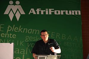 Cornelius Jansen van Rensburg besig om AfriForum se takke toe te spreek tydens die 2015 Nasionale Takkongres te Klein Kariba.