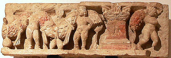 Cupids ve çelenk. Gandhara. 1St-2. yüzyıl. Musée Guimet.