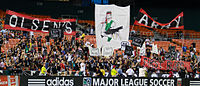 La Barra Brava display a tifo supporting Ben Olsen during a match against the FC Dallas at RFK Stadium