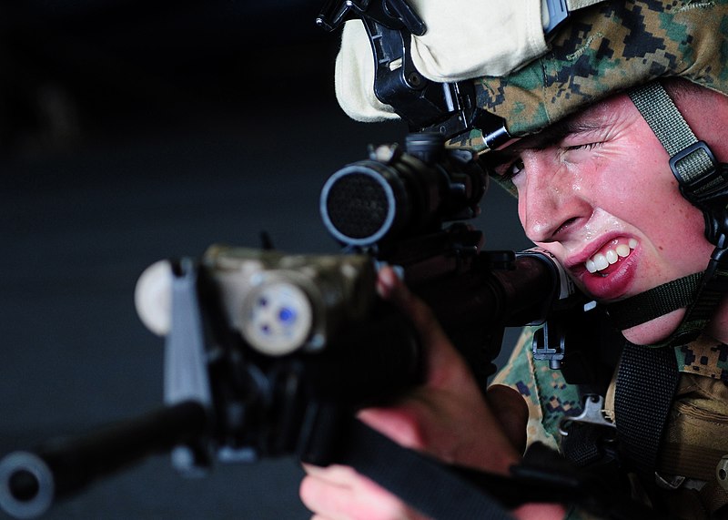 File:Defense.gov News Photo 110203-N-5538K-154 - Lance Cpl. Doug Hale assigned to the 31st Marine Expeditionary Unit participates in small-arms weapons training in the hangar bay of the.jpg