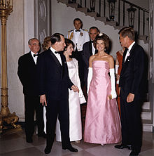 Jacqueline Kennedy, the wife of President John F. Kennedy, made pink a popular high-fashion color. Dinner in Honor of Andre Malraux.jpg