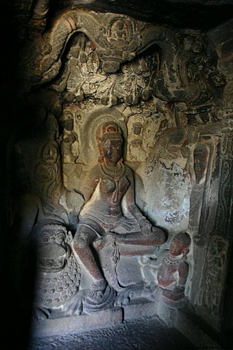 An image of Ambika under a mango tree in Cave 34 of the Ellora Caves