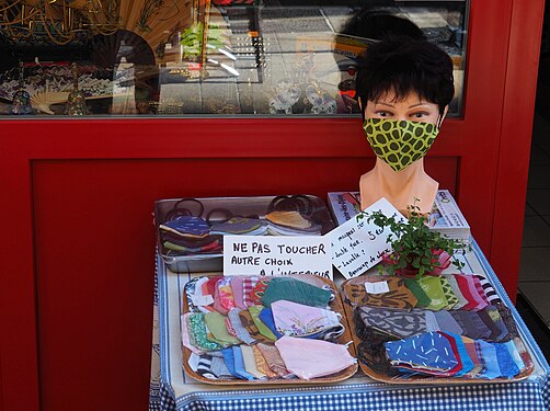 Sales display with sewn fabric masks in the first year of Covid-19-pandemic in Chalon-sur-Saône, France