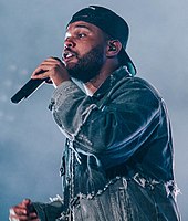 Daft Punk collaborated with the Weeknd on his songs "Starboy" and "I Feel It Coming" from his album Starboy in 2016. FEQ July 2018 The Weeknd (44778856382) (cropped).jpg