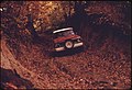 FOUR WHEEL DRIVE VEHICLE MAKING A TRIP DEEP INTO THE DONIPHAN COUNTY HARDWOOD FOREST IN THE EXTREME NORTHEAST CORNER... - NARA - 557116.jpg