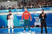 Deutsch: Fechten bei den Olympischen Jugend-Sommerspielen 2018: Tag 1, 7. Oktober 2018, Jungen, Säbel, Siegerehrung - Gold: Krisztián Rabb (HUN), Silber: Hyun Jun (KOR), Bronze: Mazen Elaraby (EGY); Medaillen überreicht durch IOC-Mitglied Britta Heidemann, Maskottchen überreicht durch FIE-Generalsekretär Emmanuel Katsiadakis English: Fencing at the 2018 Summer Youth Olympics at 7 October 2018 – Boys' sabre Medal ceremony – Gold: Krisztián Rabb (HUN), Silver: Hyun Jun (KOR), Bronze: Mazen Elaraby (EGY); Medal presenter: IOC member Britta Heidemann, Mascot presenter: FIE Secretary General Emmanuel Katsiadakis