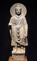 The Buddha, in Greco-Buddhist style, 1st-2nd century CE, Gandhara. (Standing Buddha (Tokyo National Museum)).