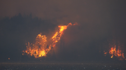 View of Howe Ridge Fire from Lake McDonald Howe Ridge Fire.png