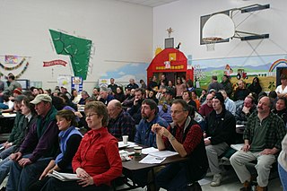 <span class="mw-page-title-main">Town meeting</span> Form of direct democracy for cities or towns