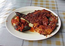 Padang style ikan bakar served in rich spices with reddish color. Ikan Bakar 1.jpg