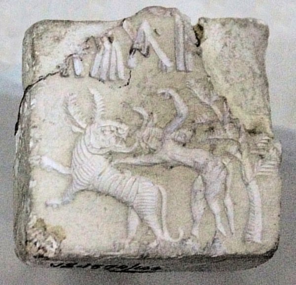 Fighting scene between a beast and a man with horns, hooves and a tail, who has been compared to the Mesopotamian bull-man, suggestive of Indus–Mesopo