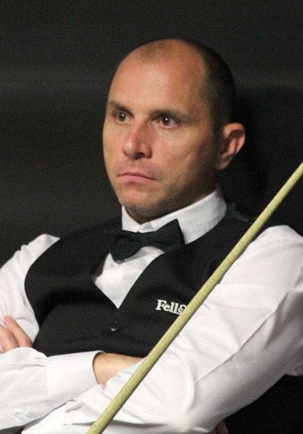Joe Perry defeated world number 1, and defending champion, Mark Selby in the first round.