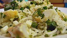 Kedgeree, an Anglo-Indian dish imported from the British Raj, is commonly found in Indo-Canadian restaurants. Kedgeree.jpg