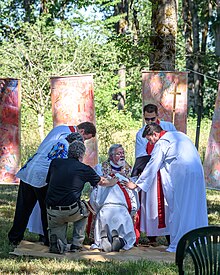 Allen (center) ordains a priest in the Diocese of Churches for the Sake of Others in an outdoor service in Portland, Oregon. Kurtley Knight ordination to the Anglican Priesthood 14.jpg