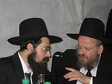 Finkel (left) and Rabbi Refoel Partzovitz LaizerYudelandRParovitz.jpg