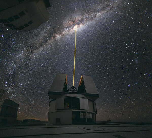 The Paranal Observatory of European Southern Observatory shooting a laser guide star to the Galactic Center