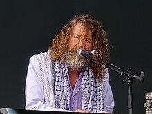 Ó Maonlaí performing with Hothouse Flowers in 2024